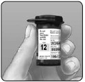 OneTouch - Ultra Mini - Controleer de code op de flacon met teststrips voordat u de teststrip plaatst Controleer de code op de flacon met teststrips voordat u de teststrip plaatst