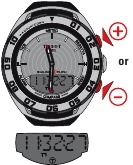 Pijl omhoog: 1 minuut vooruit. Pijl omlaag: 1 minuut achteruit (wijzers en weergave)