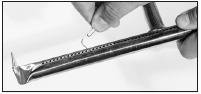Verstopte poorten reinigen met een paperclip