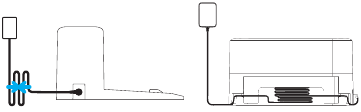 De adapter aansluiten op het oplaadstation