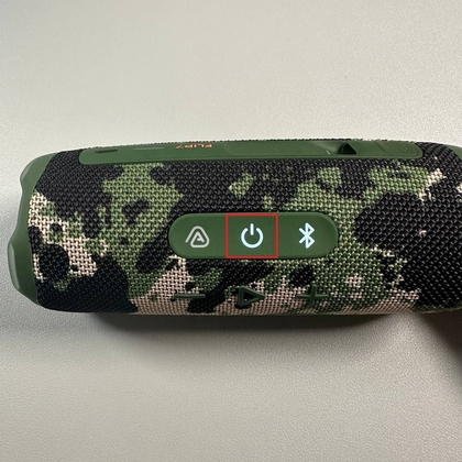 JBL Flip 7 aan/uit-knop