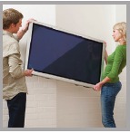 Foto van een tv aan de muur