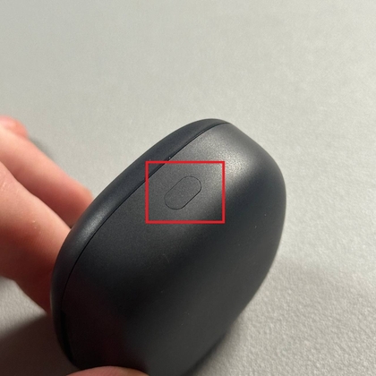 Caseknop indrukken met indicatielampje